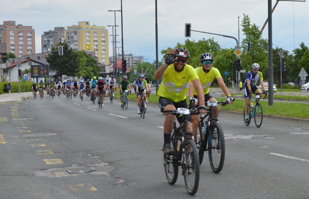 two cyclists riding bikes at marathon