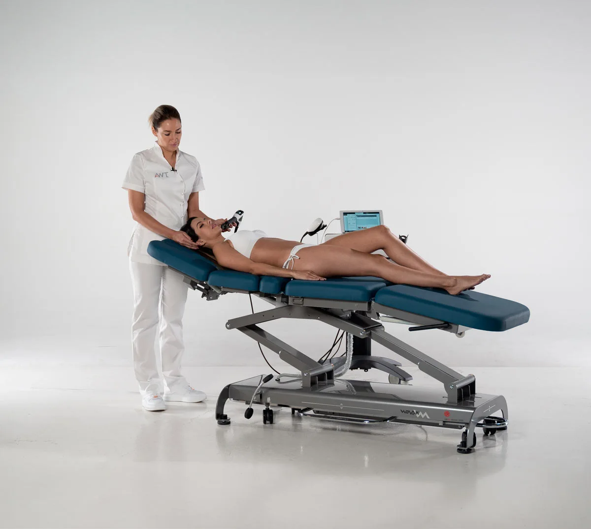 female lying on treatment table during laser treatment